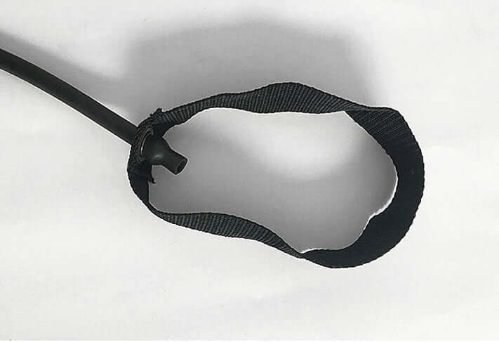 Yoga resistance band handle designed for strength training and flexibility exercises.
